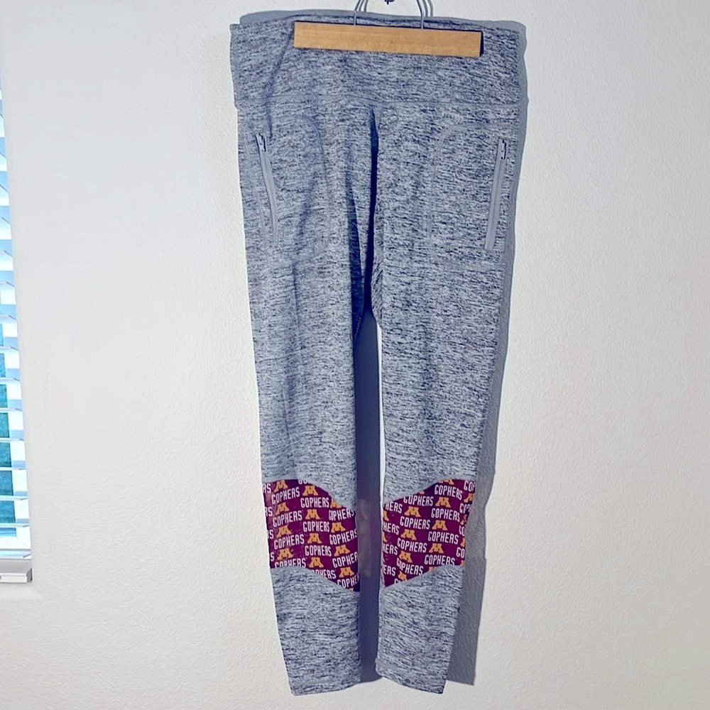 University of Minnesota Leggings with Mesh Detail and front pockets with zippers